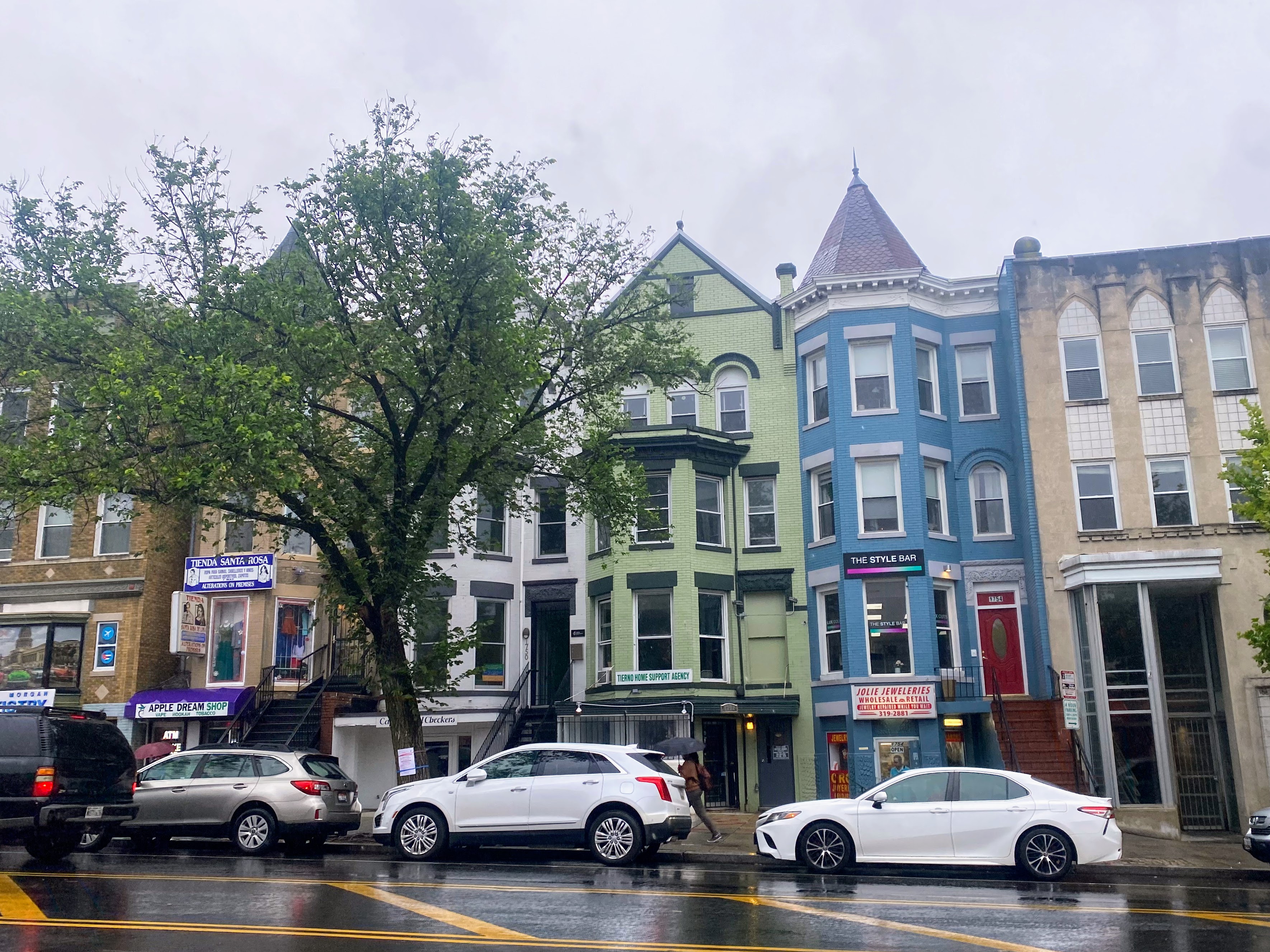 A row of brightly-colored buildings on Columbia Road NW in Adams Morgan.
