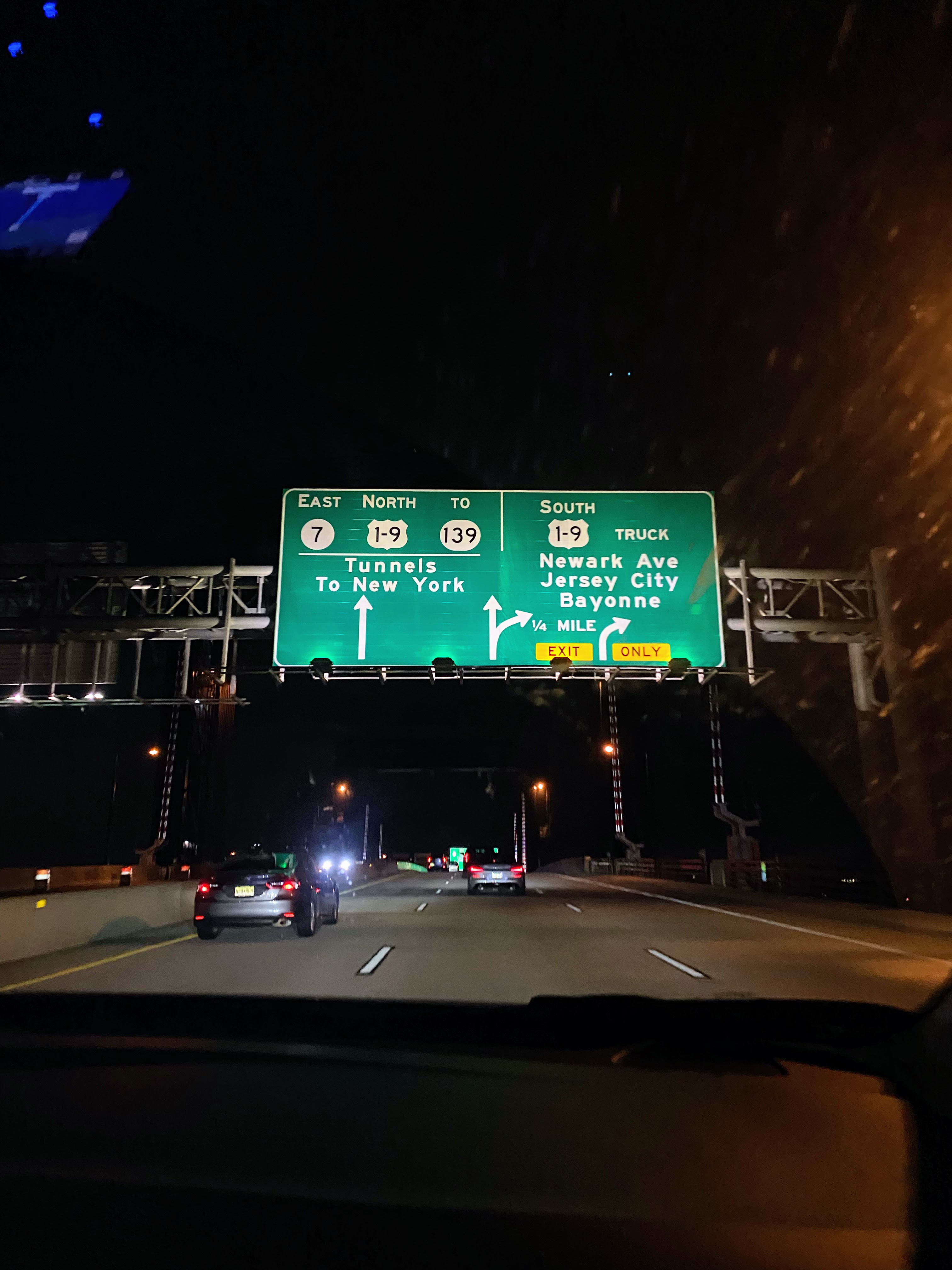 A highway sign just outside New York City.