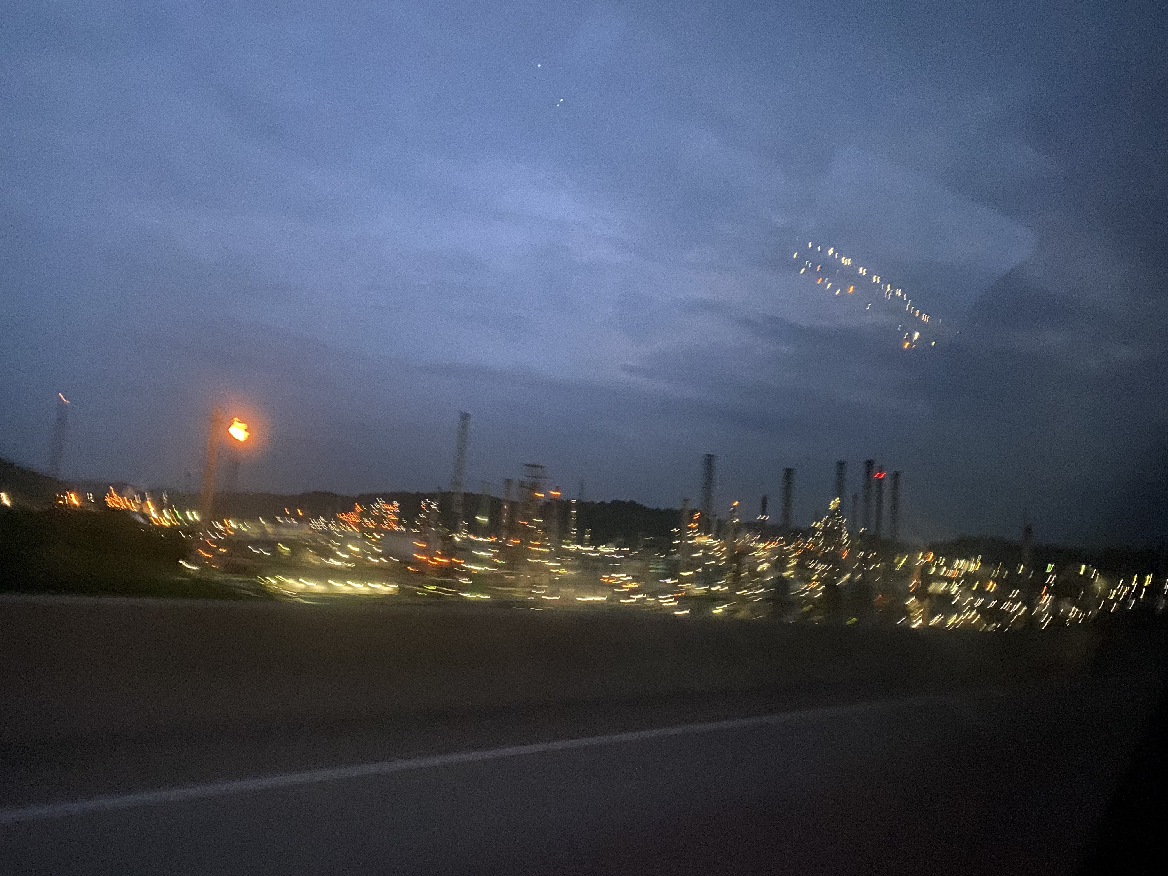 An industrial complex at night.
