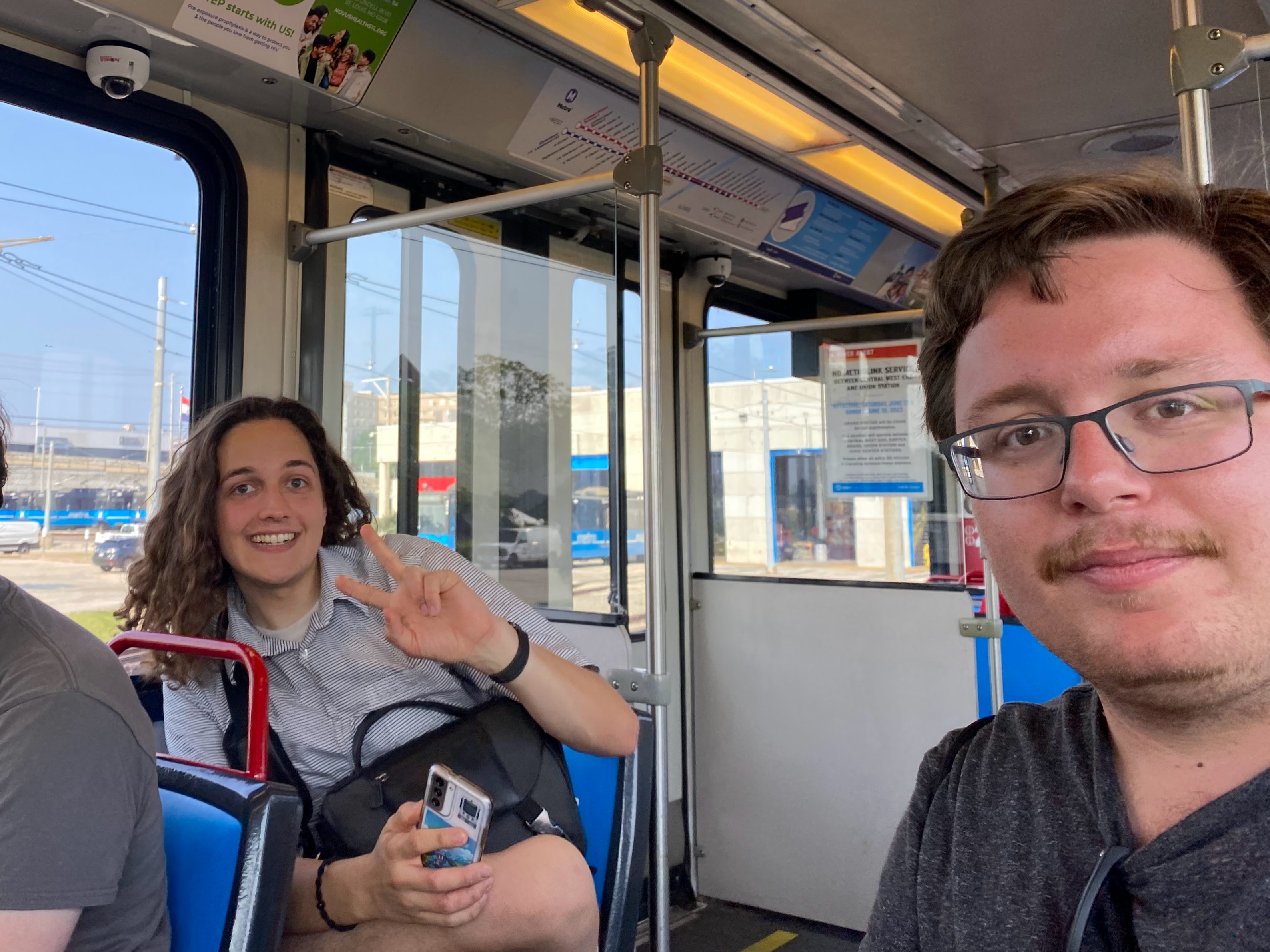 A photo of Rice and Ethan on a St Louis Metrolink train.